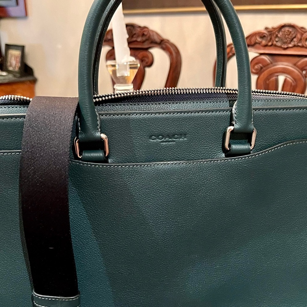 Brand new Coach messenger bag,  laptop bag, and briefcase.